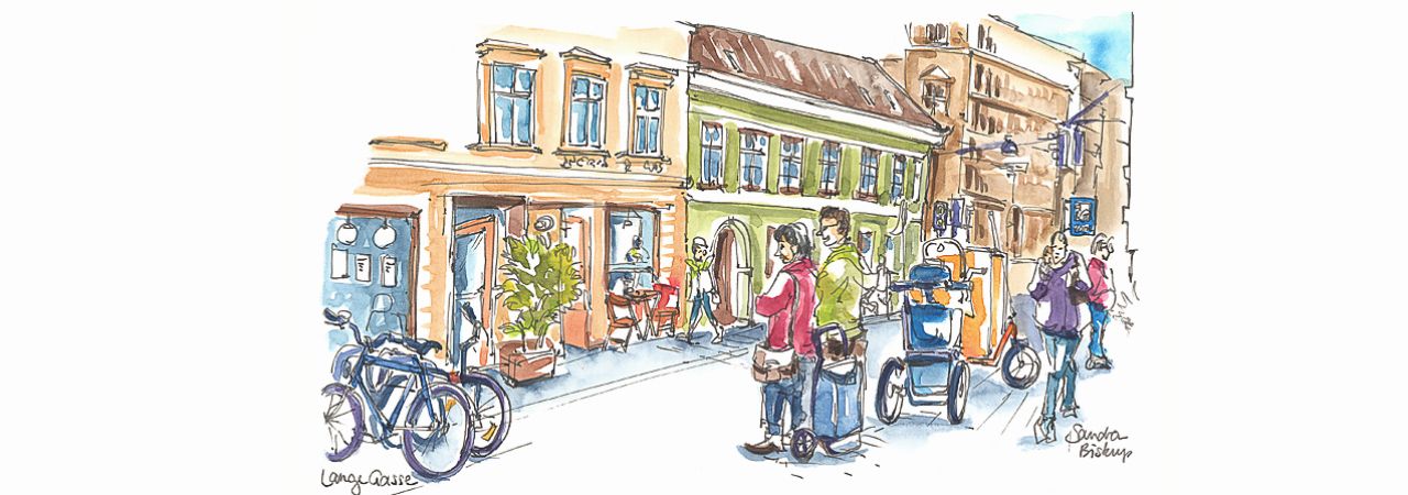 Na rysunku: Scenka uliczna w strefie spotkań przy Lange Gasse